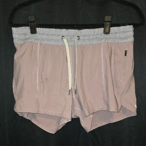 Vuori Women's Athletic Shorts in Light Pink-ish Purple and Gray
